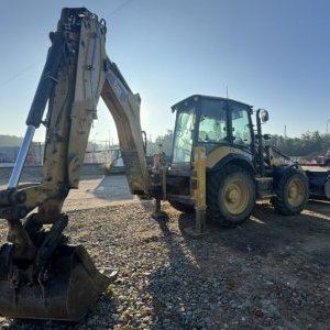 foto CAT 444 F2 platniczki 4lyzki koparko-ladowarka